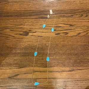 Kendra Scott necklace.